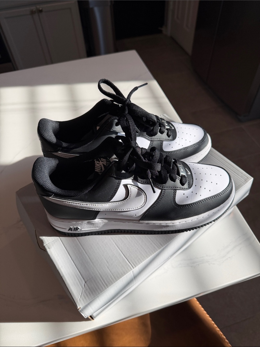 Nike Air Low-Top Sneakers in Black and White
